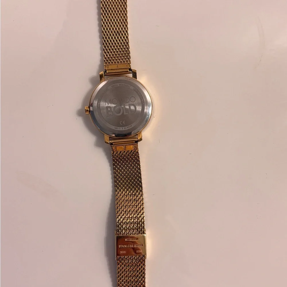 Movado Gold Mesh Women's Watch
Used in fair condition. Needs a new battery. - Picture 3 of 7